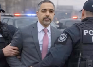 An AI-generated image depicting Trita Parsi being arrested by ICE agents