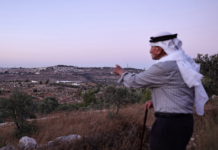 Olayan Olayan, who was born in the village of Battir in 1941, overlooks a valley in which a new Israeli settler outpost is built