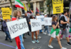 Protesters from Americans Abroad Against the War (AAAW) taking part in a recent Auckland march against the US war on Iran