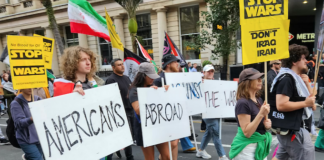 Protesters from Americans Abroad Against the War (AAAW) taking part in a recent Auckland march against the US war on Iran