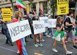 Protesters from Americans Abroad Against the War (AAAW) taking part in a recent Auckland march against the US war on Iran