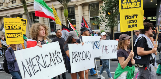 Protesters from Americans Abroad Against the War (AAAW) taking part in a recent Auckland march against the US war on Iran