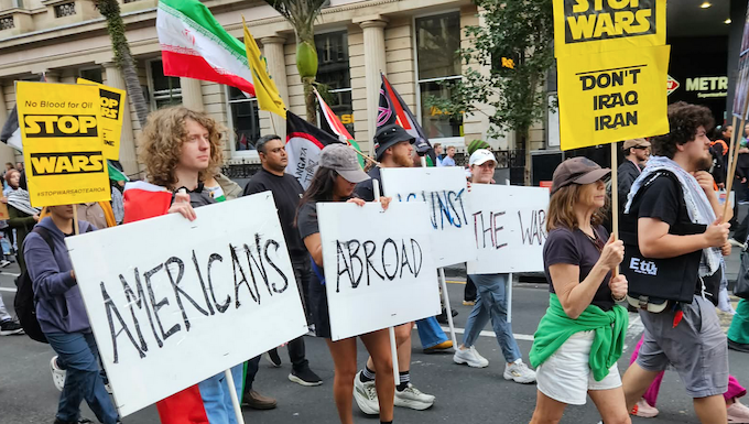 Protesters from Americans Abroad Against the War (AAAW) taking part in a recent Auckland march against the US war on Iran