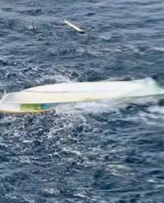 One of the capsized boats off the coast of PNG's East New Britain