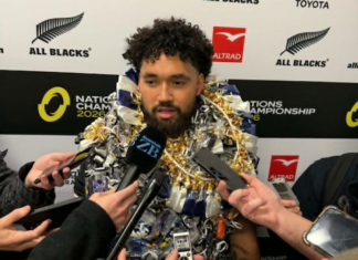 Fehi Fineanganofo garlanded by family speaks to the media after the All Blacks defeated France 34-32 in Christchurch