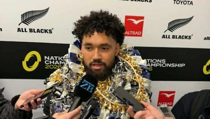 Fehi Fineanganofo garlanded by family speaks to the media after the All Blacks defeated France 34-32 in Christchurch
