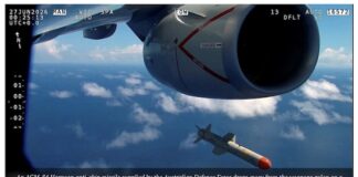 An AGM-84 Harpoon anti-ship missile supplied by the Australian Defence Force drops from an RNZ Air Force Poseidon patrol aicraft during a love fire exercise