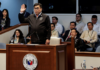 Filipino National Bureau of Investigation Director Melvin Matibag takes an oath before testifying