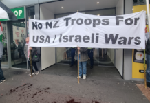 Pro-Palestine and anti-war protesters picket the US Consulate in Auckland during today's "US Invasion Day" rally