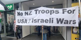 Pro-Palestine and anti-war protesters picket the US Consulate in Auckland during today's "US Invasion Day" rally