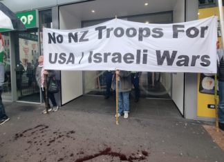Pro-Palestine and anti-war protesters picket the US Consulate in Auckland during today's "US Invasion Day" rally