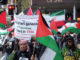 Iranian and Palestinian flags at a New Zealand rally against the war on Iran and the Gaza genocide