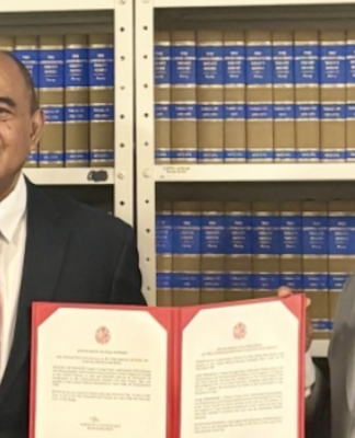 Tonga ratifies nuclear test ban treaty amid China missile debacle Tonga's Permanent Representative to the UN Viliami Va'inga Tōnē (left)