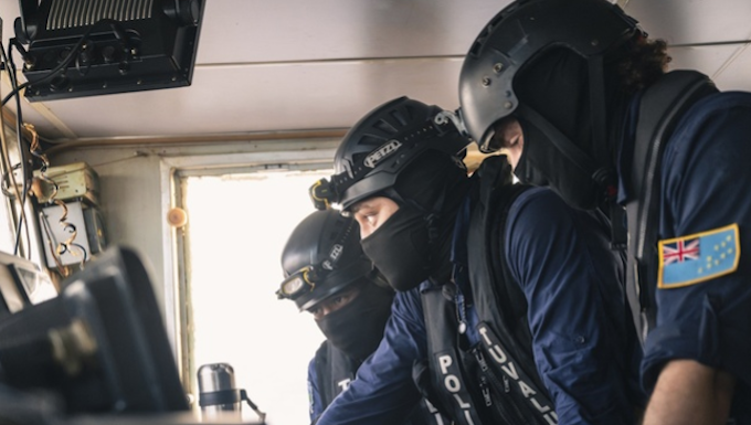 Tuvalu police inspecting the bridge of the arrested Chinese longliner Lu Rong Yuan Yu 138