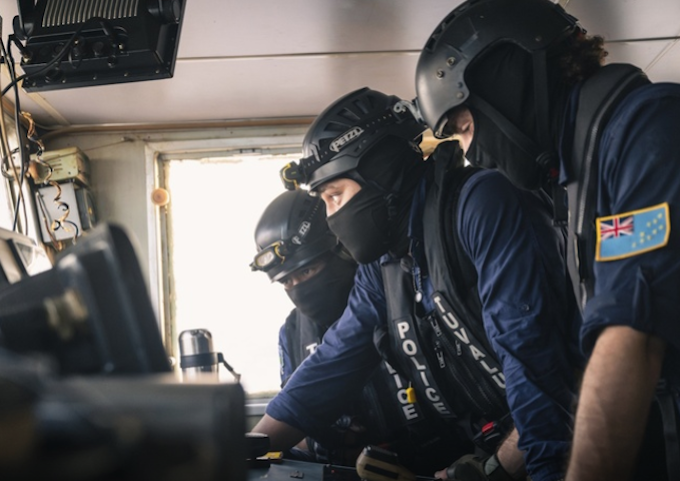 Tuvalu police SS 680wide Tuvalu police inspecting the bridge of the arrested Chinese longliner Lu Rong Yuan Yu 138