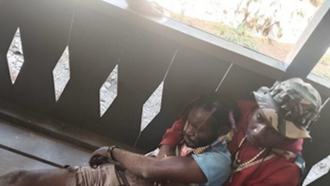 A Papuan casualty on Monday