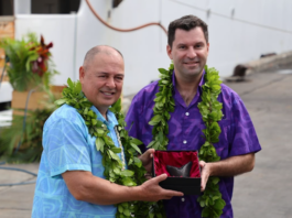 Cook Islands caretaker Prime Minister Mark Brown and US Ambassador Jared Novelly exchange gifts
