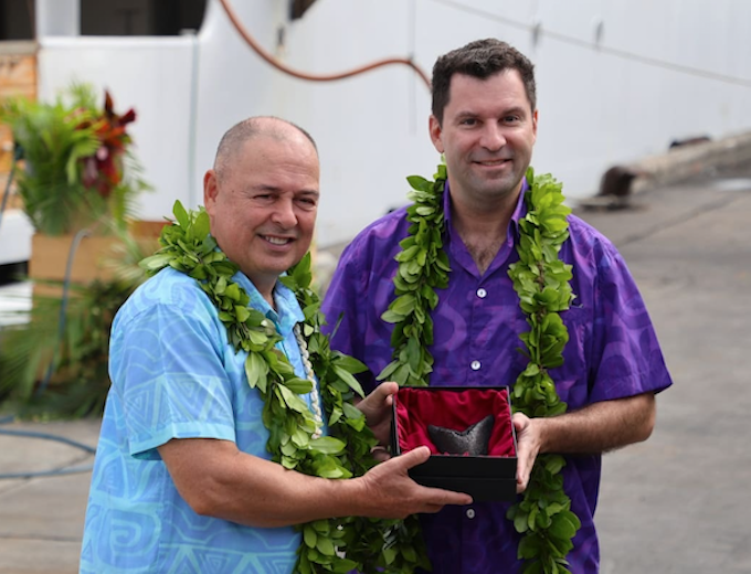 COOKS Brown & Novelly RNZ 680wide Cook Islands caretaker Prime Minister Mark Brown and US Ambassador Jared Novelly exchange gifts