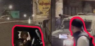 Israeli soldiers facing Palestinian reporters near Nablus