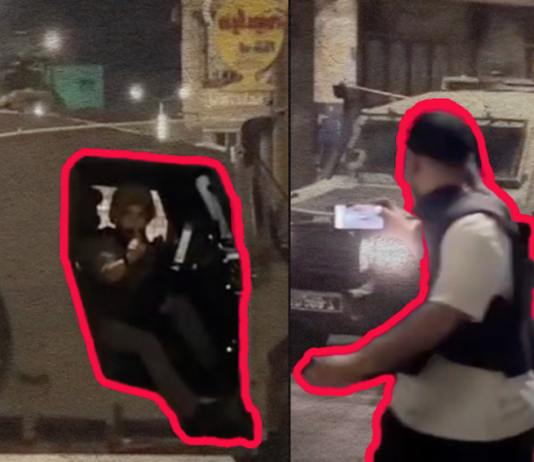 Israeli soldiers facing Palestinian reporters near Nablus