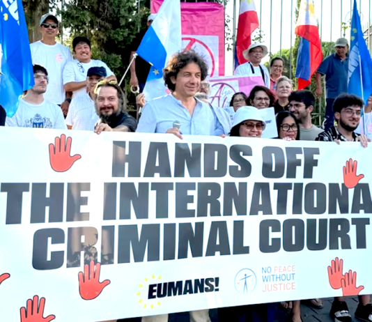 Defenders of the International Criminal Court, led by the pan-European group Eumans, rally in Rome