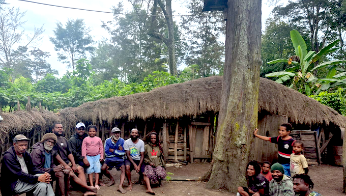 The author, Laurens Ikinia, with extended whānau - family (he is pictured fourth from left)