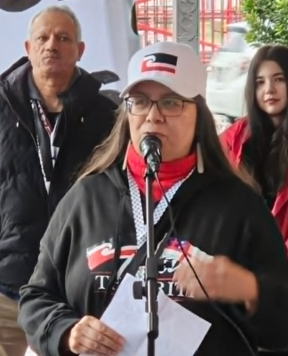PSNA's Leeann Wahanui-Peters reading out Te Pāti Māori's statement for co-leader Debbie Ngarewa-Packer