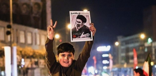 Crowds gather in Tehran on March 9 to celebrate the appointment of Iran's new Supreme Leader, Ayatollah Seyed Mojtaba Khamenei