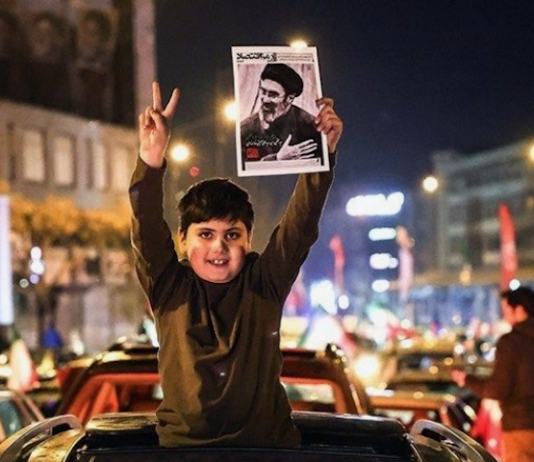 Crowds gather in Tehran on March 9 to celebrate the appointment of Iran's new Supreme Leader, Ayatollah Seyed Mojtaba Khamenei