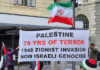 Pioneer of Palestine protest in NZ warns against the IDF ‘obscenity’ becoming normalised A banner at today's rally in Auckland's Te Komititanga Square