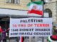 A banner at today's rally in Auckland's Te Komititanga Square