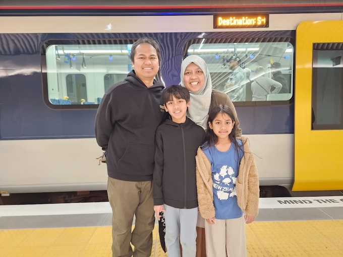 Arrenda Maryzona with her husband and two sons