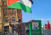 Protester Craig Tynan "shows the flag"