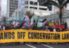 Protesters march down Auckland's Queen St