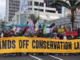 Protesters march down Auckland's Queen St