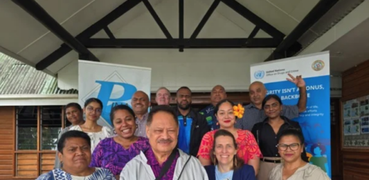 Pacific Islands News Association (PINA) president Kalafi Moala (front, second from left) with participants of the Climate Change and Corruption roundtable