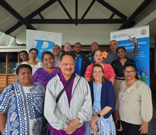 UN adviser tells Pacific journalists to probe ‘accountability’ in climate change, disaster funding Pacific Islands News Association (PINA) president Kalafi Moala (front, second from left) with participants of the Climate Change and Corruption roundtable