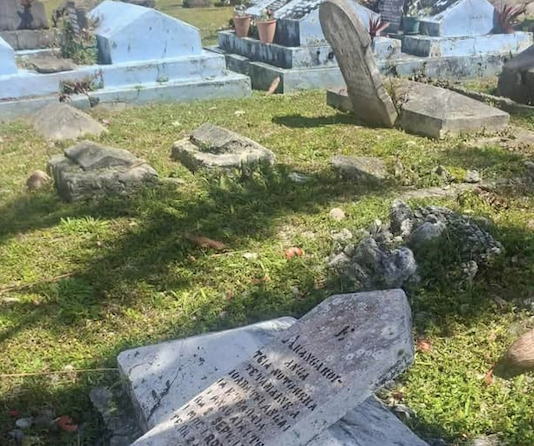 Vandalised Nikao Cemetery