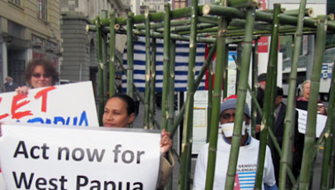 West Papua activist calls on Pacific leaders to pressure Indonesia over UN visit West Papuan activist Paula Makabory (centre, holding banner) at a protest in Auckland in 2011