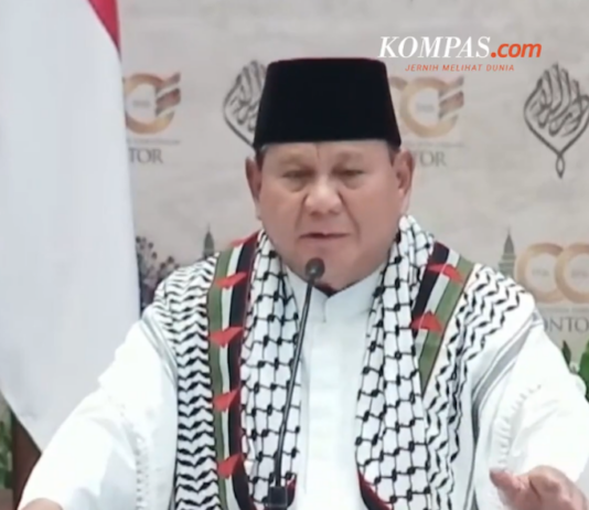 Indonesia's President Prabowo speaking dressed in a keffiyeh