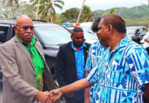 Fijian Media Association general secretary Stanley Simpson (right) greets Prime Minister Sitiveni Rabuka at the 8th Pacific Media Summit in Savusavu