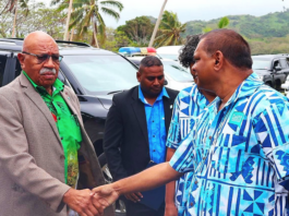 Fijian Media Association general secretary Stanley Simpson (right) greets Prime Minister Sitiveni Rabuka at the 8th Pacific Media Summit in Savusavu