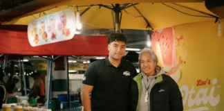 Siaosi (George) Lavelua serving 'otai for his parents business