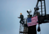 A Greenpeace deep-sea mining protester dressed as US President Donald Trump