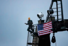 A Greenpeace deep-sea mining protester dressed as US President Donald Trump