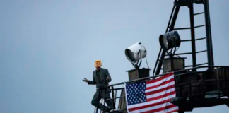 A Greenpeace deep-sea mining protester dressed as US President Donald Trump