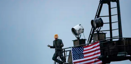 A Greenpeace deep-sea mining protester dressed as US President Donald Trump