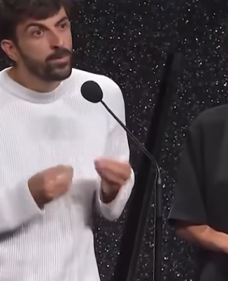 Israeli filmmaker Yuval Abraham and co-director Rachel Szor receiving the Venice Special Jury Prize for their critical Gaza war film