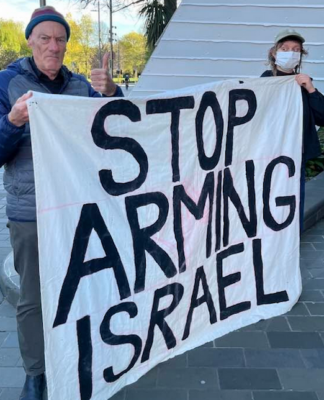 Palestine Solidarity Network Aotearoa (PSNA) national coordinator John Minto and another protester at the New Zealand aerospace summit
