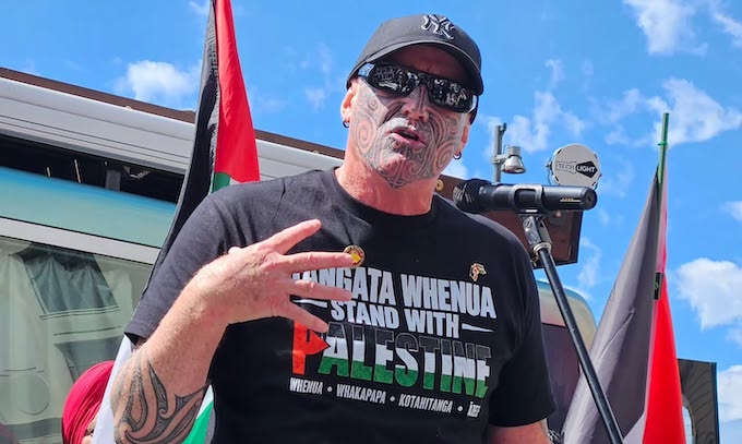 Hahona Ormsby speaking at the the Global March rally in Tāmaki Makaurau 